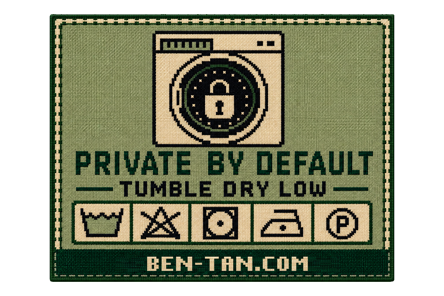 A green woven laundry tag with a washing machine, Private by Default, Tumble Dry Low, and care symbols.